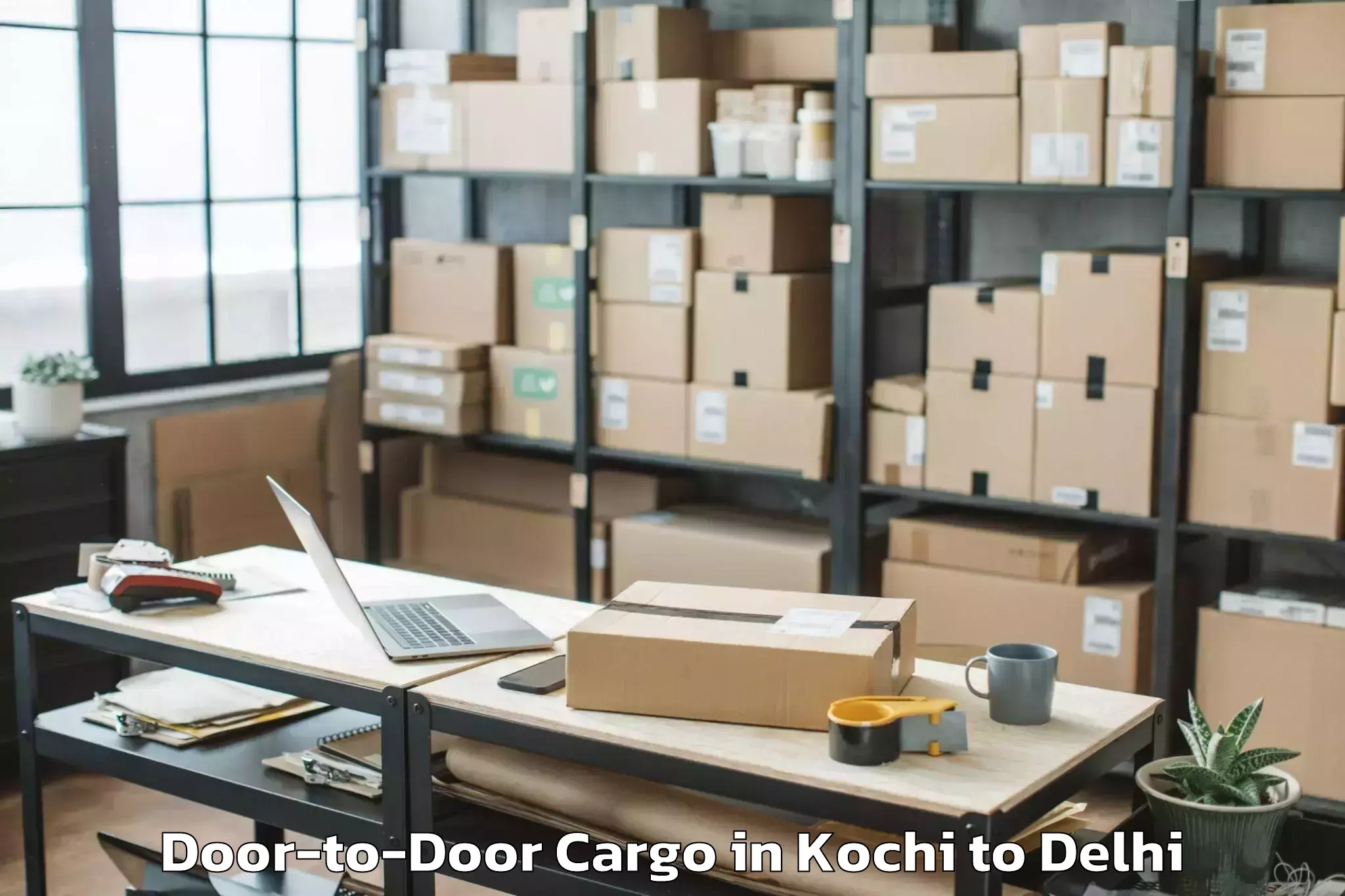 Book Kochi to V3s East Centre Mall Door To Door Cargo Online